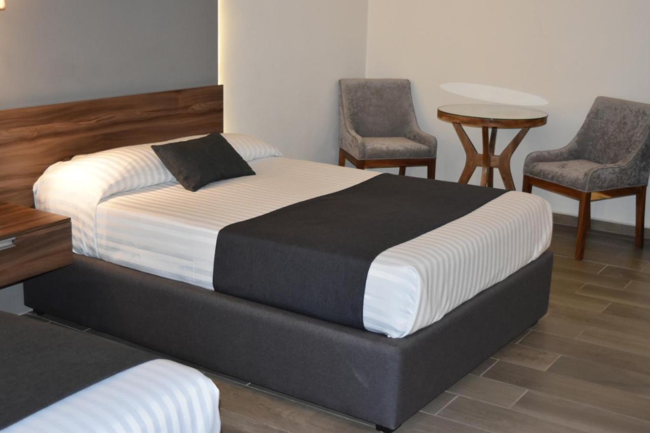 Estanza Hotel & Suites Morelia Buitenkant foto