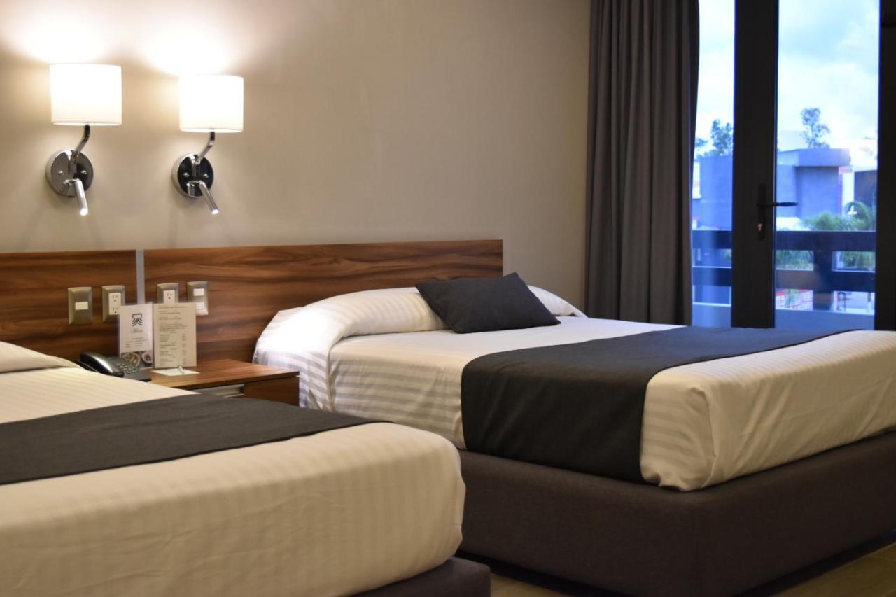 Estanza Hotel & Suites Morelia Buitenkant foto
