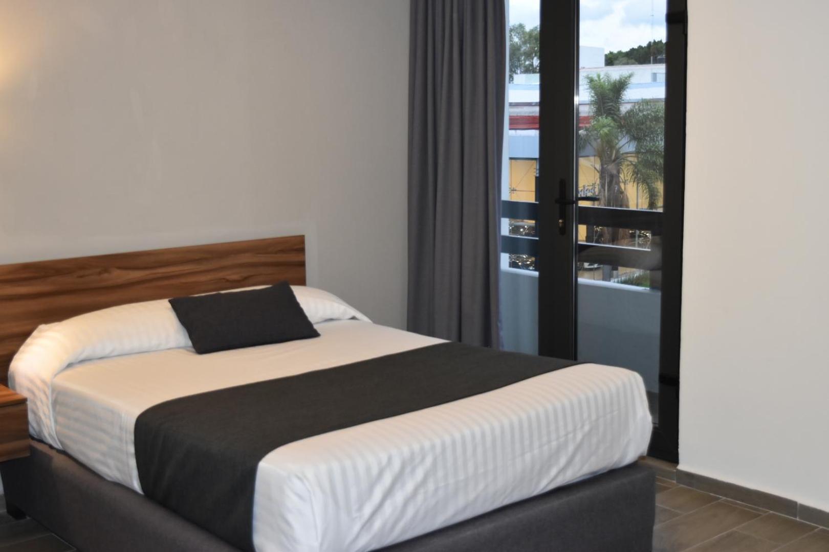 Estanza Hotel & Suites Morelia Kamer foto